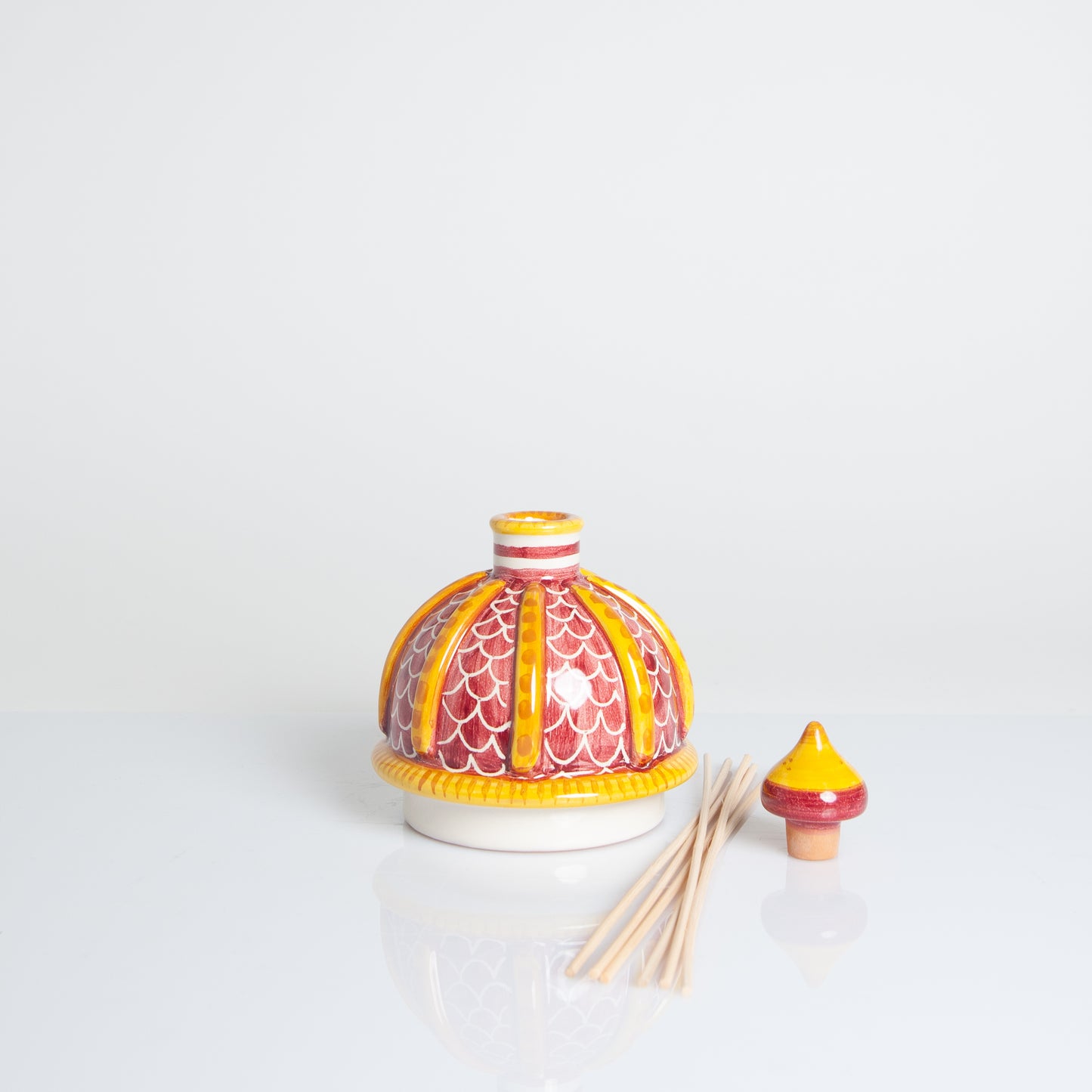 Yellow/red perfumer dome