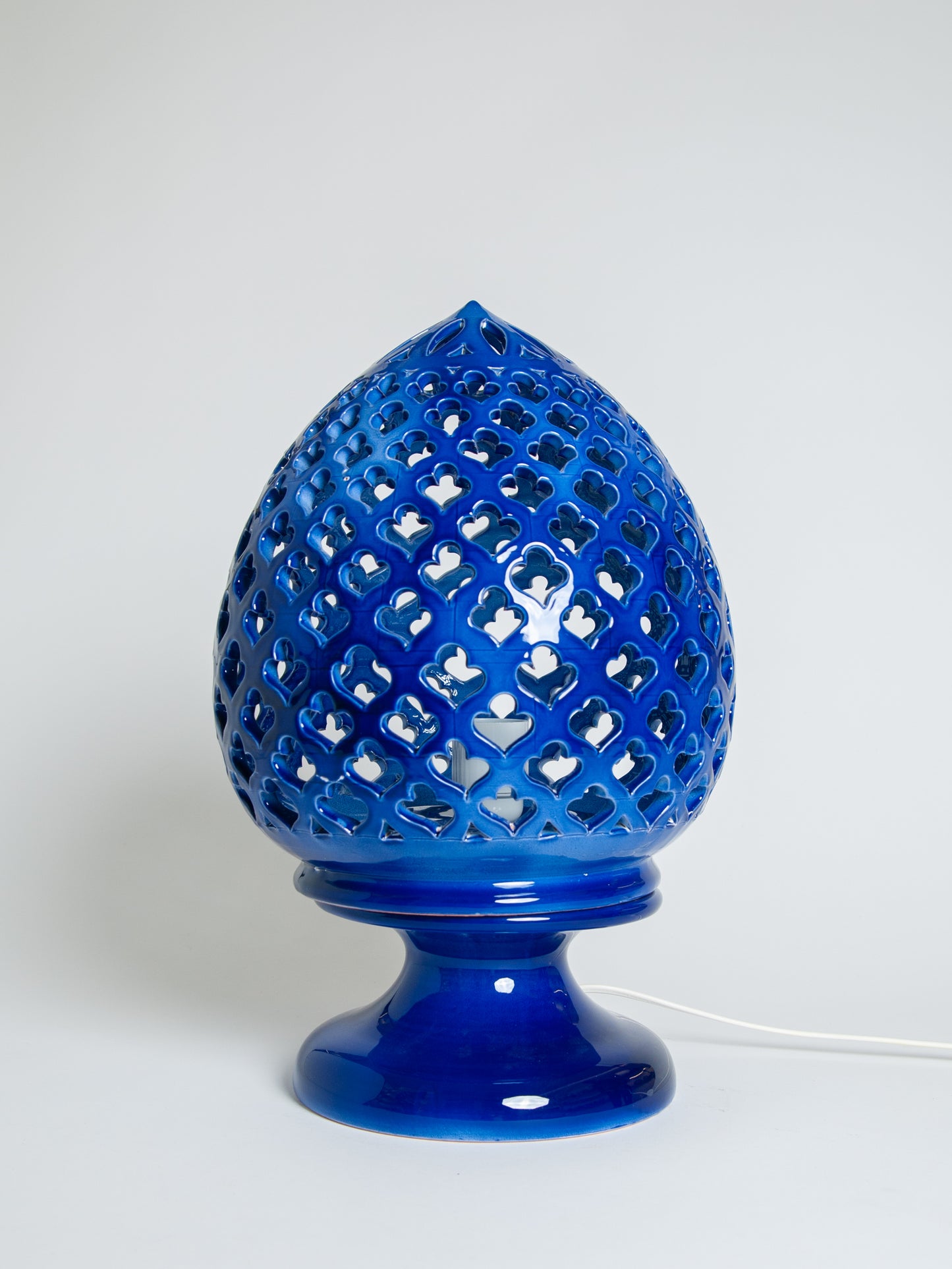 Lampada traforata blu 1