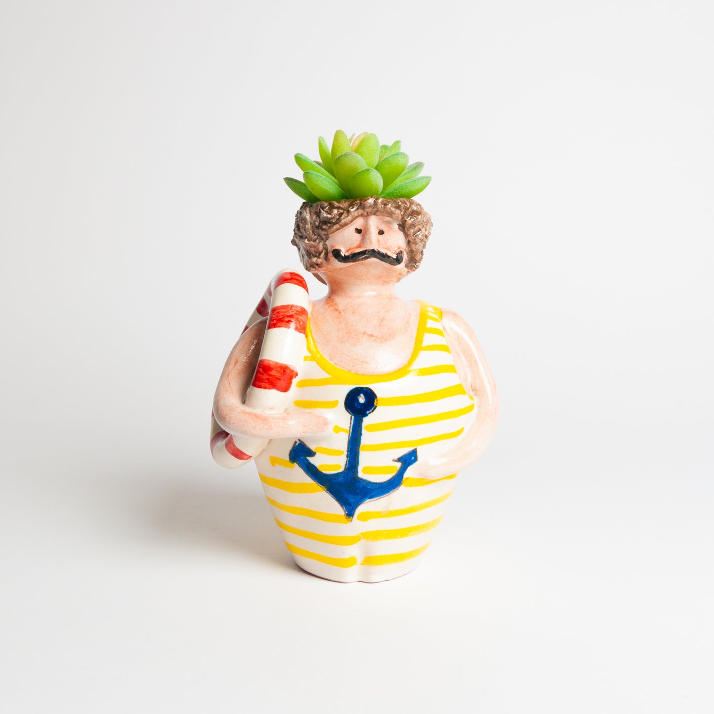Yellow Positano male doll at sea