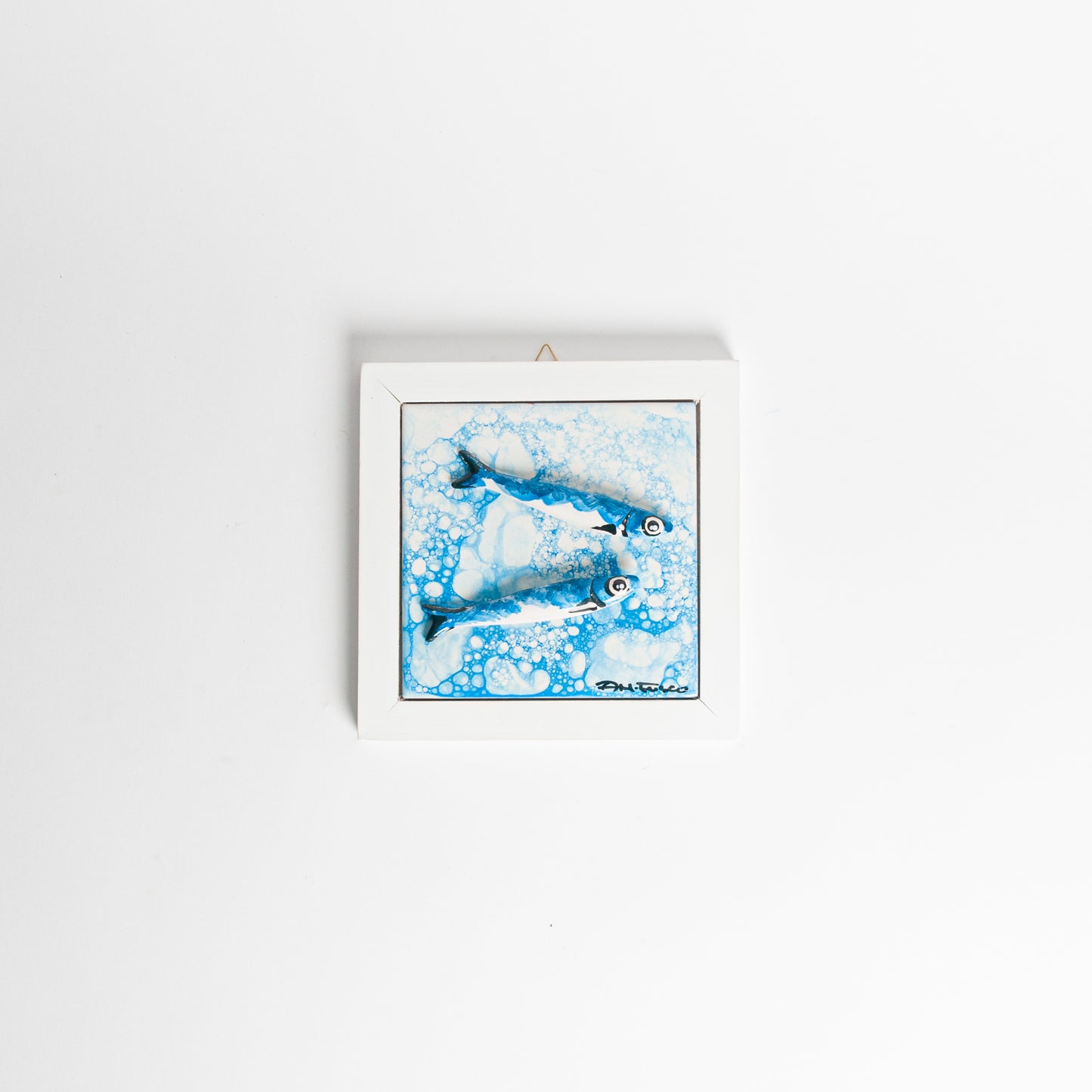 Quadretto pesci azzurro cornice bianca
