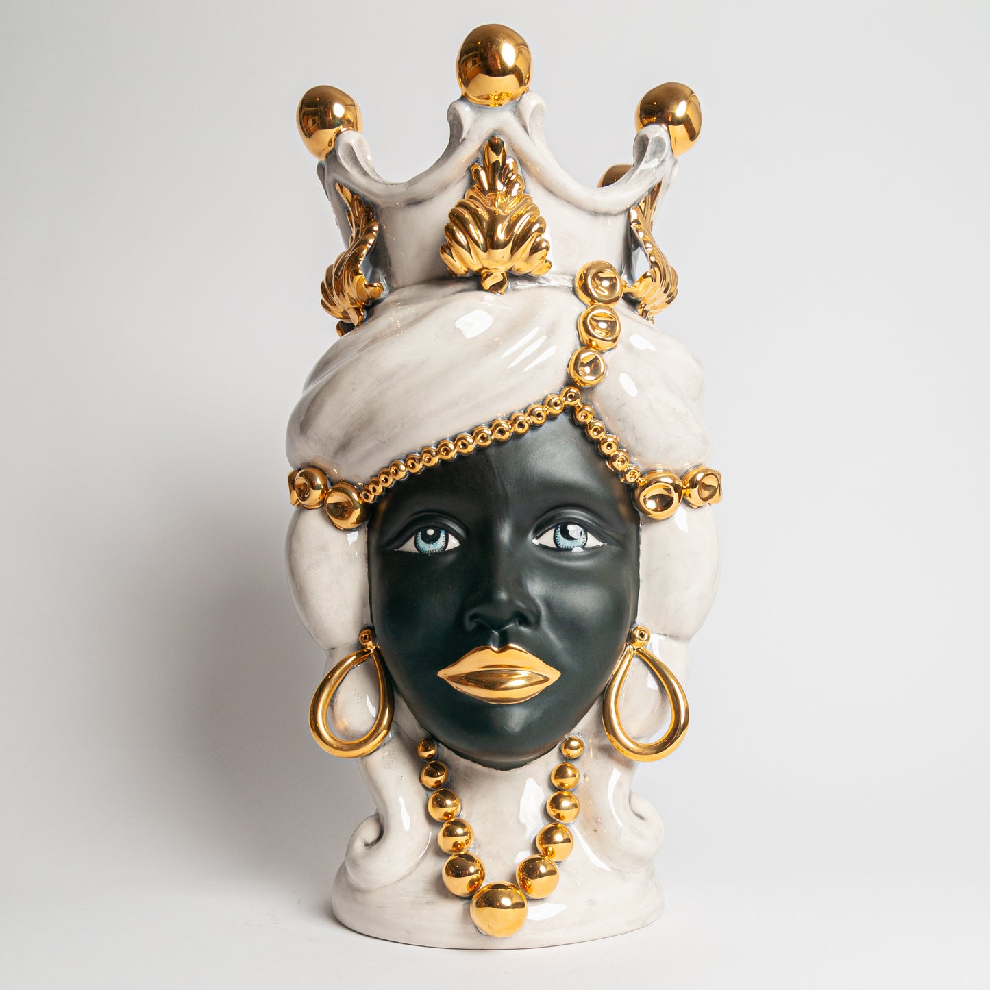 Testa di moro grande oro faccia nera donna