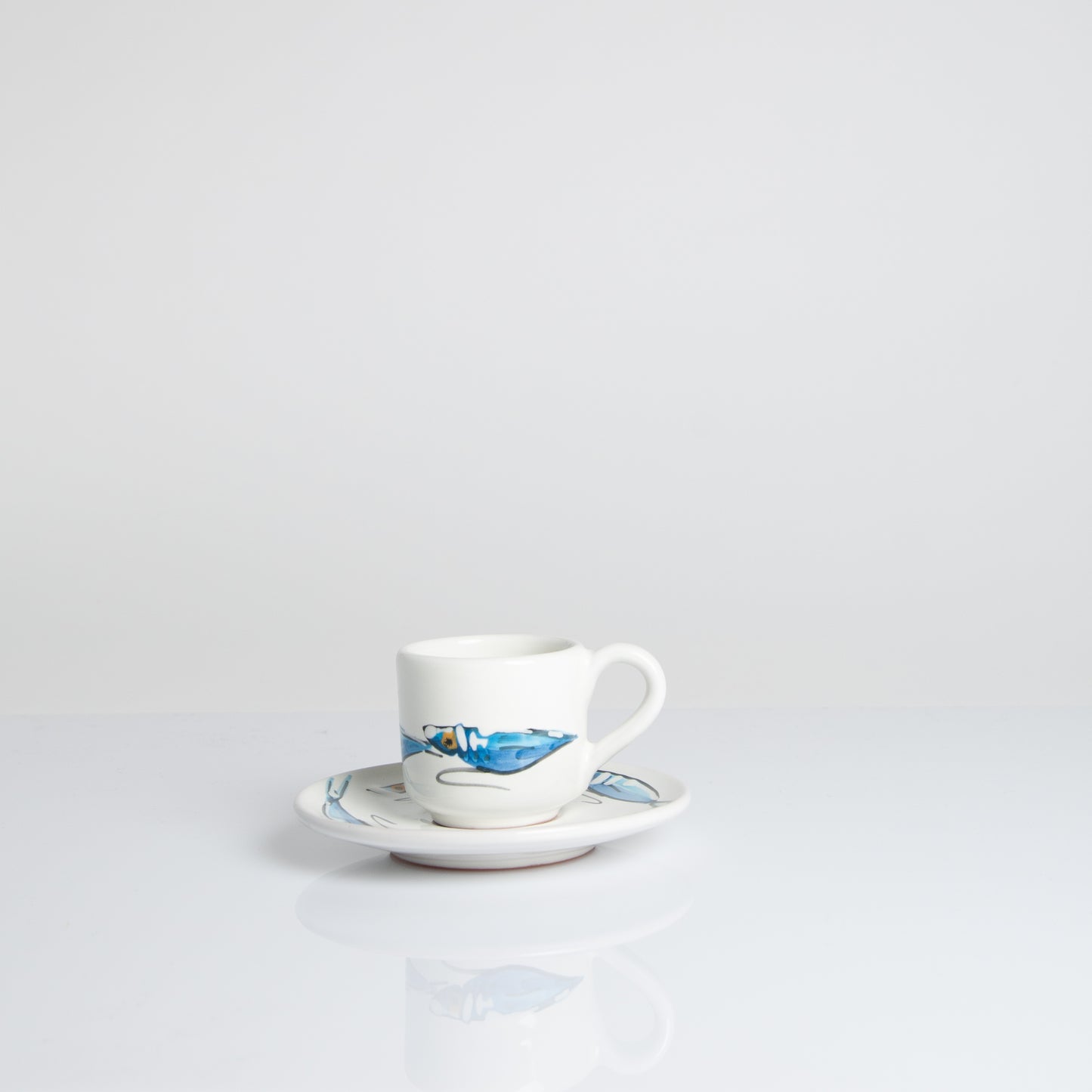 Anchovies coffee cup with saucer